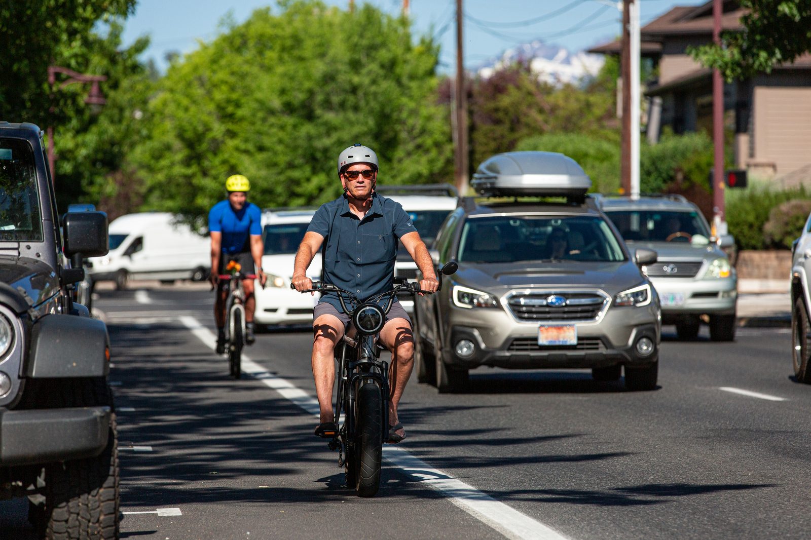 File photo: a rider travels in a marked green bike lane in Bend, Oregon. Police said the Westminster woman was riding east in the Warner Avenue bike lane on Saturday when her e-bike struck a raised concrete curb.