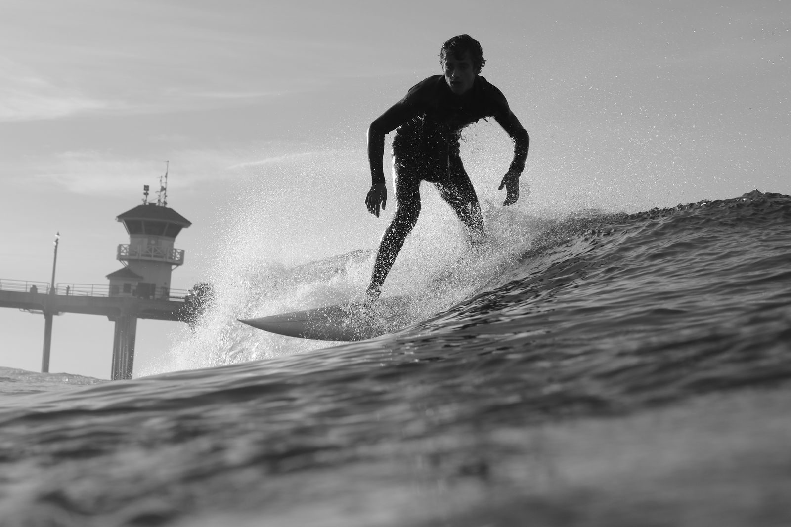 Surf at Huntington Beach. Founder Nathan Fluellen describes the event as the largest gathering of Black surfers in history.