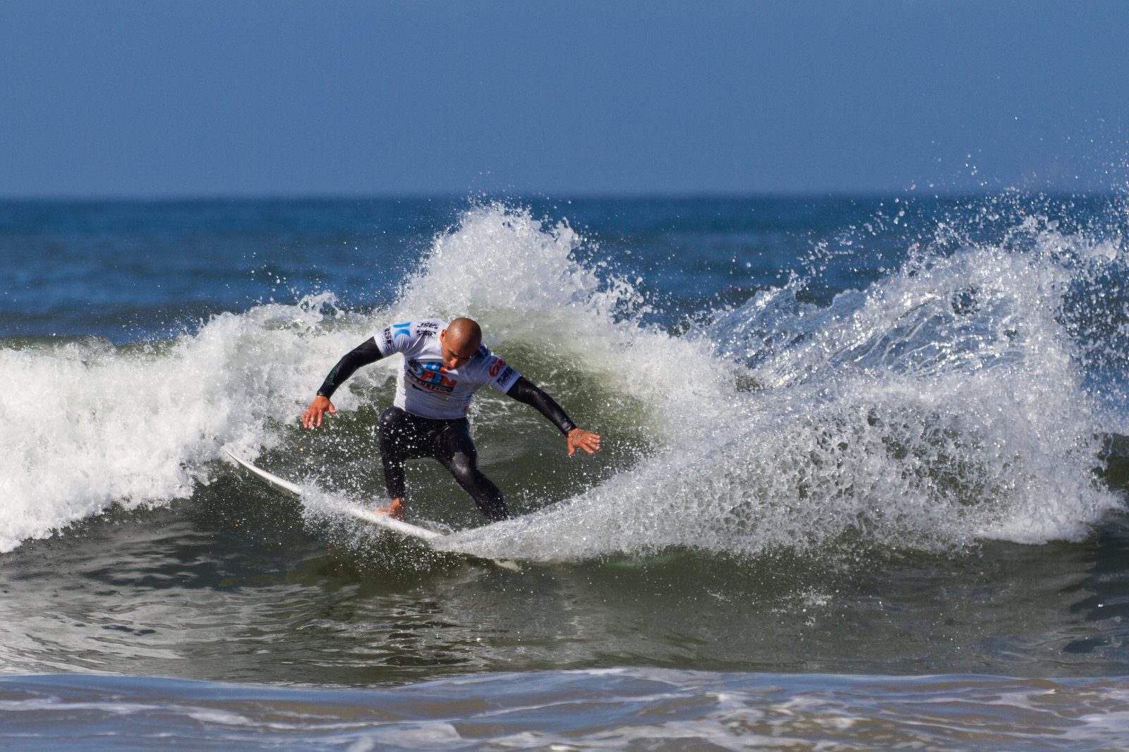 File photo: a competitor carves through whitewater at Huntington Beach during the U.S. Open of Surfing. Saturday's Stoke competitors surfed Hurricane Rachel swell reported at 6 to 8 feet.
