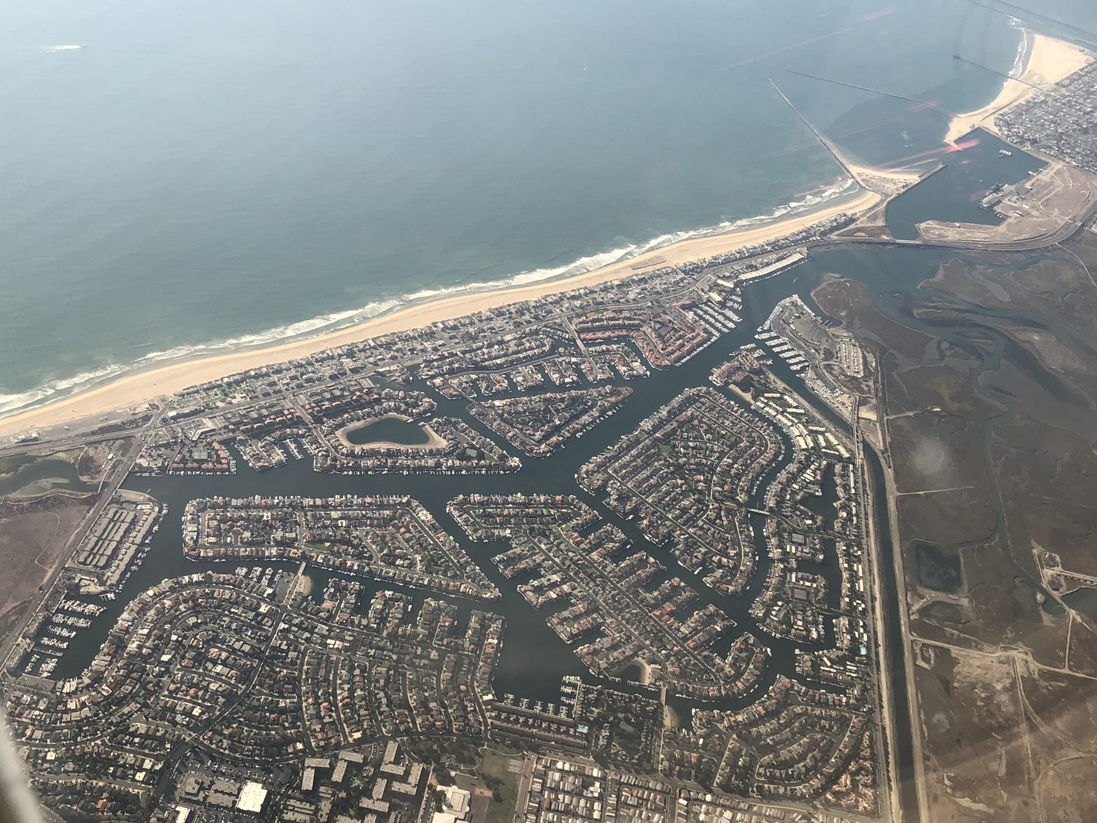 The shoreline near Sunset Beach in Huntington Beach; state spill officials and the Coast Guard responded to the harbor after a sunken vessel leaked an estimated 450 gallons of fuel.