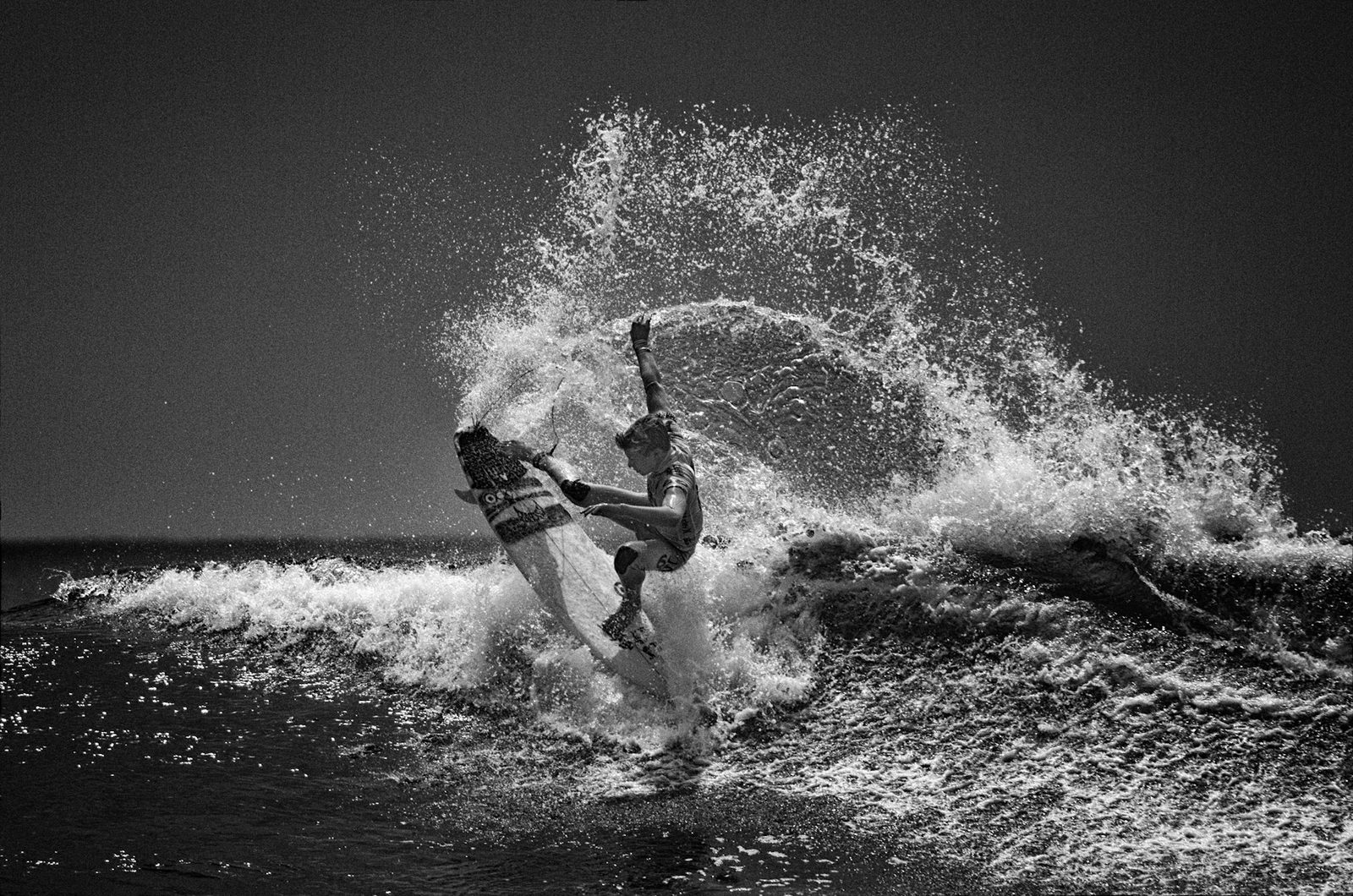 A surfer rides a wave at the Huntington Beach U.S. Open of Surfing. Forecasters warned of life-threatening surf and rip current conditions through the weekend.